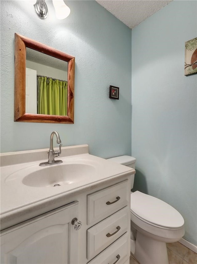 600 Erin Cir, Leander, TX 78641 - full bath featuring vanity, a textured ceiling, and tile patterned flooring