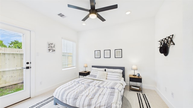 2712 Jensen Creek Ln, Houston, TX 77026 - bedroom featuring multiple windows, light colored carpet, recessed lighting, and ceiling fan