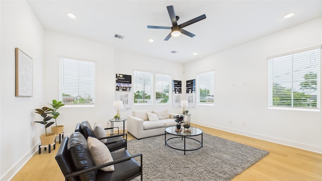 2712 Jensen Creek Ln, Houston, TX 77026 - living area featuring light wood-style floors, a ceiling fan, and recessed lighting
