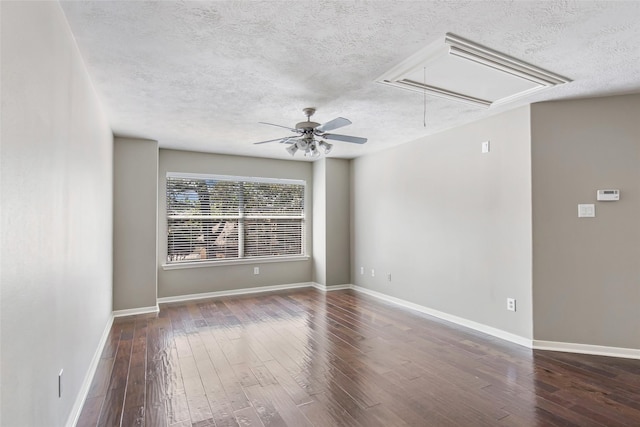 19002 Volley Vale Ct, Humble, TX 77346 - unfurnished room with attic access, hardwood / wood-style flooring, a textured ceiling, and ceiling fan