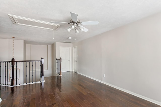 19002 Volley Vale Ct, Humble, TX 77346 - spare room featuring attic access, wood finished floors, a ceiling fan, and a textured ceiling