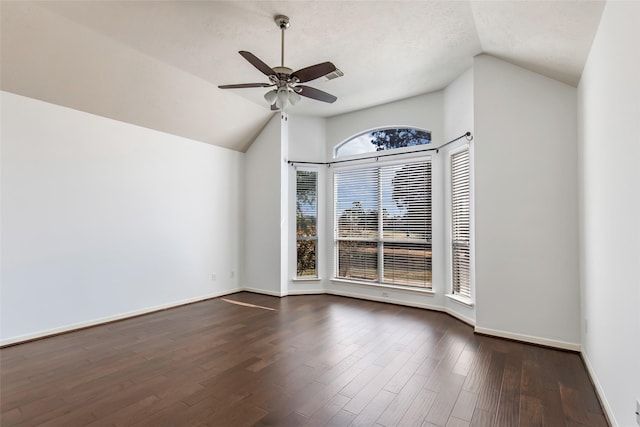 19002 Volley Vale Ct, Humble, TX 77346 - spare room with lofted ceiling, a ceiling fan, and dark wood-type flooring