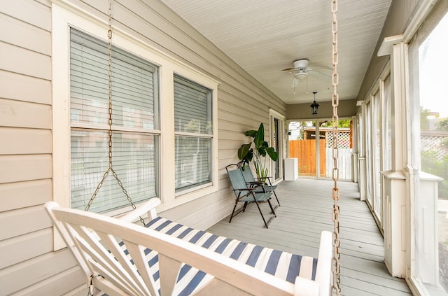90 Dennis St, Houston, TX 77006 - sunroom / solarium featuring ceiling fan, plenty of natural light, and wood finished floors