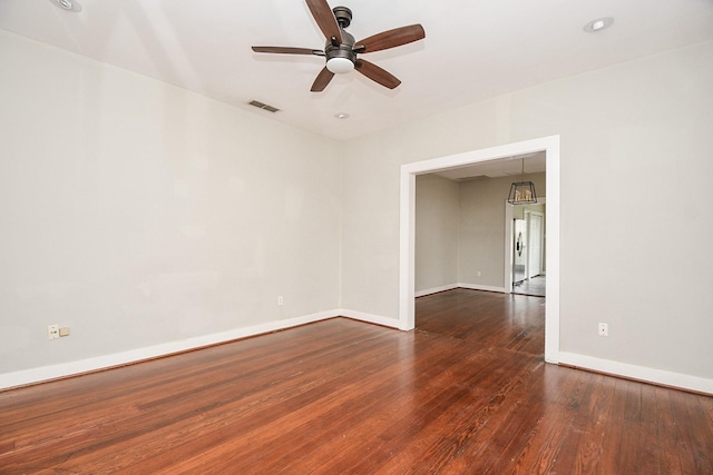 90 Dennis St, Houston, TX 77006 - empty room with a ceiling fan and dark wood-type flooring
