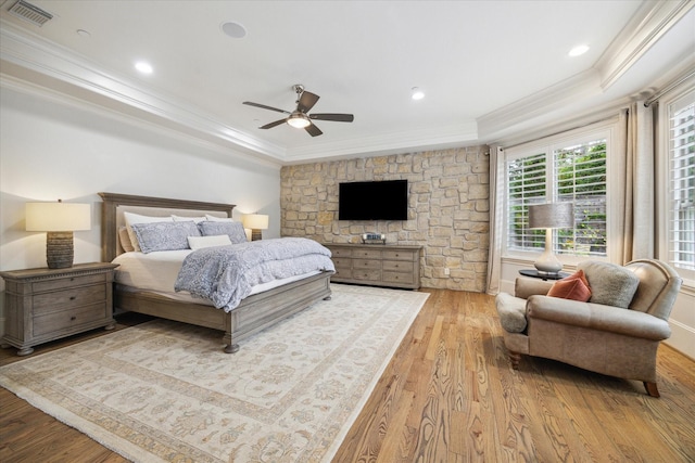2 Burkhart Forest Ct, Spring Valley Village, TX 77055 - bedroom with ornamental molding, wood finished floors, a tray ceiling, and a ceiling fan