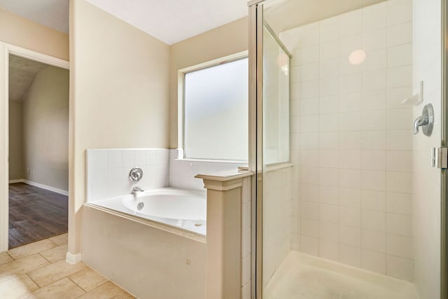 3434 Fiorella Way, Humble, TX 77338 - full bathroom featuring a shower stall, a garden tub, and tile patterned floors