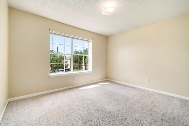 3434 Fiorella Way, Humble, TX 77338 - spare room featuring carpet floors and baseboards
