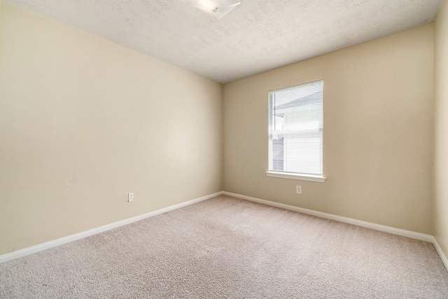 3434 Fiorella Way, Humble, TX 77338 - unfurnished room featuring carpet and a textured ceiling