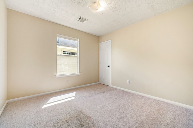 3434 Fiorella Way, Humble, TX 77338 - unfurnished room featuring carpet floors and a textured ceiling