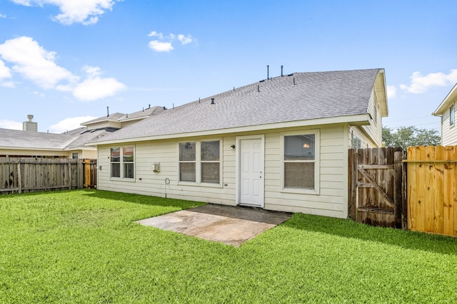 3434 Fiorella Way, Humble, TX 77338 - rear view of property with a fenced backyard, a shingled roof, a patio area, and a gate