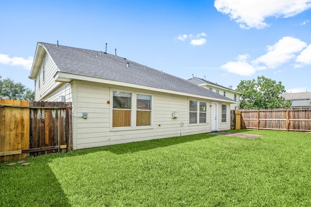 3434 Fiorella Way, Humble, TX 77338 - rear view of house featuring a shingled roof and a fenced backyard