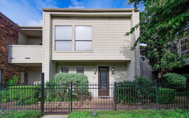 5701 Winsome Ln Unit 2, Houston, TX 77057 - view of property with a balcony