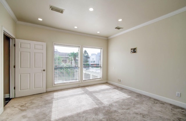 5701 Winsome Ln Unit 2, Houston, TX 77057 - empty room with light colored carpet, crown molding, and recessed lighting
