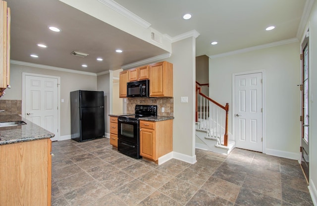 5701 Winsome Ln Unit 2, Houston, TX 77057 - kitchen with black appliances, tasteful backsplash, recessed lighting, dark stone countertops, and crown molding