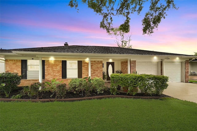 12814 Westmere Dr, Houston, TX 77077 - single story home with a garage, concrete driveway, brick siding, and a yard