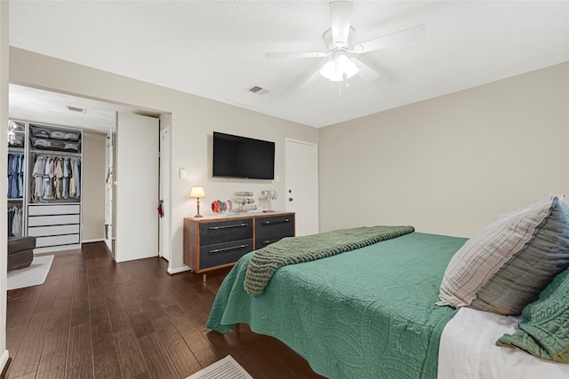 12814 Westmere Dr, Houston, TX 77077 - bedroom featuring dark wood-type flooring and a ceiling fan
