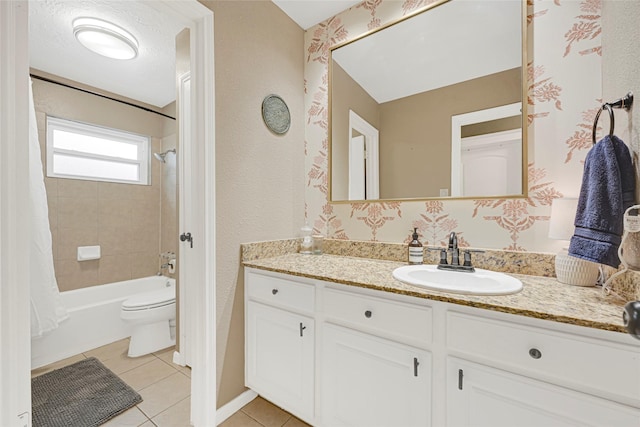 12814 Westmere Dr, Houston, TX 77077 - full bath featuring tile patterned floors, vanity, shower / bath combo, and a textured wall