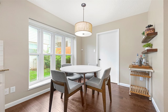 12814 Westmere Dr, Houston, TX 77077 - dining room with healthy amount of natural light and dark wood-type flooring