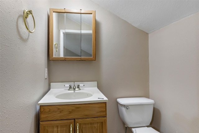 627 S Hyannis Port St, Crosby, TX 77532 - half bathroom with vanity and a textured ceiling