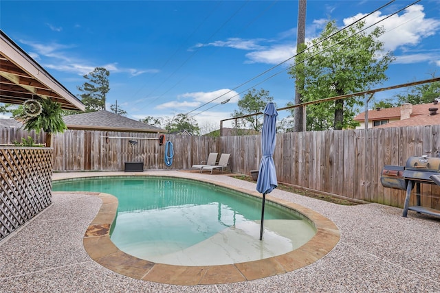 627 S Hyannis Port St, Crosby, TX 77532 - view of pool featuring a grill and a fenced backyard