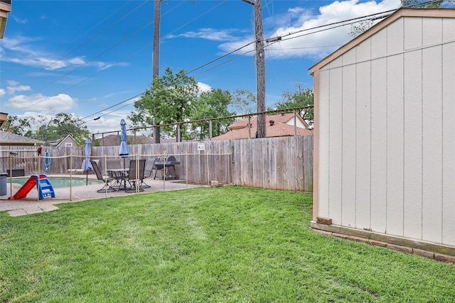 627 S Hyannis Port St, Crosby, TX 77532 - fenced backyard with a patio area
