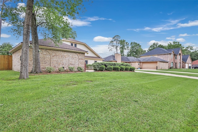 627 S Hyannis Port St, Crosby, TX 77532 - view of front facade with brick siding, a garage, and roof with shingles