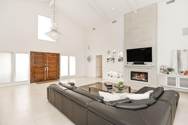 8911 Birdwood Ct, Houston, TX 77096 - living room with high vaulted ceiling, beam ceiling, and a large fireplace