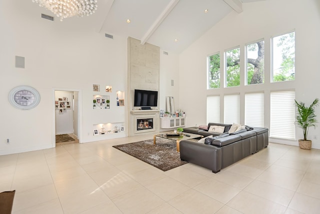8911 Birdwood Ct, Houston, TX 77096 - tiled living room with high vaulted ceiling, beam ceiling, a chandelier, and a fireplace
