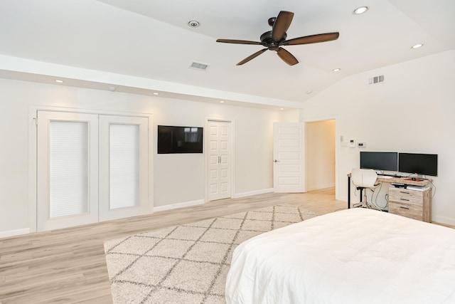 8911 Birdwood Ct, Houston, TX 77096 - bedroom with lofted ceiling, recessed lighting, light wood-style flooring, two closets, and ceiling fan