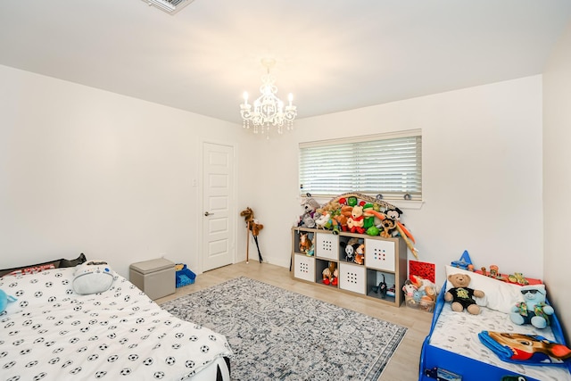 8911 Birdwood Ct, Houston, TX 77096 - bedroom with a chandelier