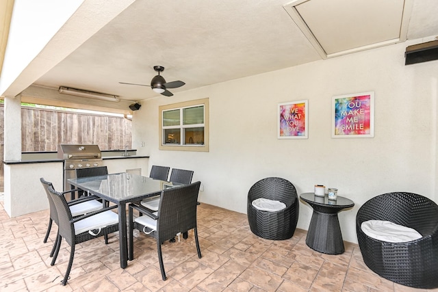 8911 Birdwood Ct, Houston, TX 77096 - view of patio featuring area for grilling, outdoor dining area, and a ceiling fan
