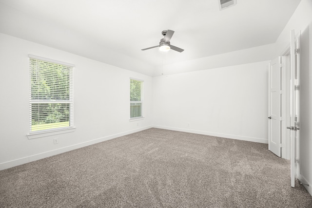 15308 Sandhill Crane Ln, Conroe, TX 77384 - carpeted empty room featuring a ceiling fan and baseboards