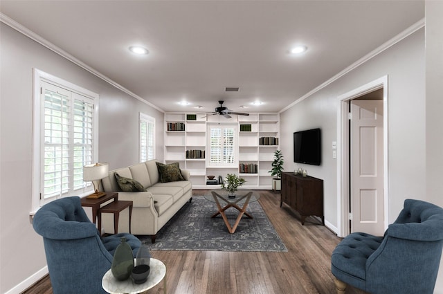 5541 Schumacher Ln, Houston, TX 77056 - living room featuring dark wood-type flooring, ornamental molding, a ceiling fan, and recessed lighting