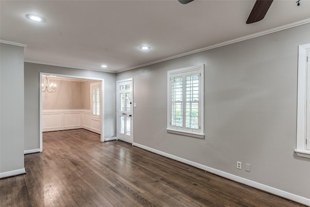 5541 Schumacher Ln, Houston, TX 77056 - foyer entrance featuring ornamental molding, dark wood finished floors, a chandelier, recessed lighting, and a ceiling fan