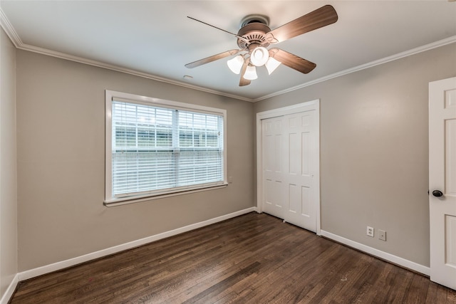 5541 Schumacher Ln, Houston, TX 77056 - unfurnished bedroom featuring dark wood-type flooring, ornamental molding, a closet, and ceiling fan