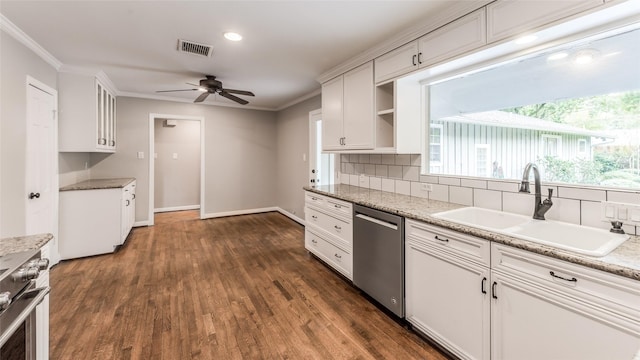 5541 Schumacher Ln, Houston, TX 77056 - kitchen with stainless steel dishwasher, a ceiling fan, range, backsplash, and ornamental molding