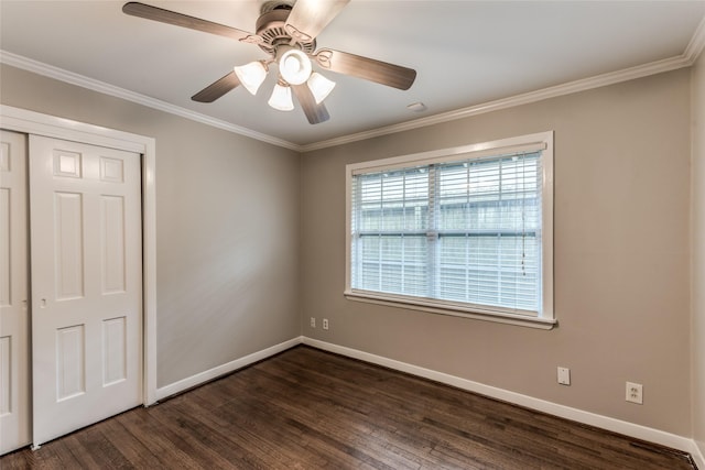 5541 Schumacher Ln, Houston, TX 77056 - spare room with dark wood-style floors, crown molding, and ceiling fan