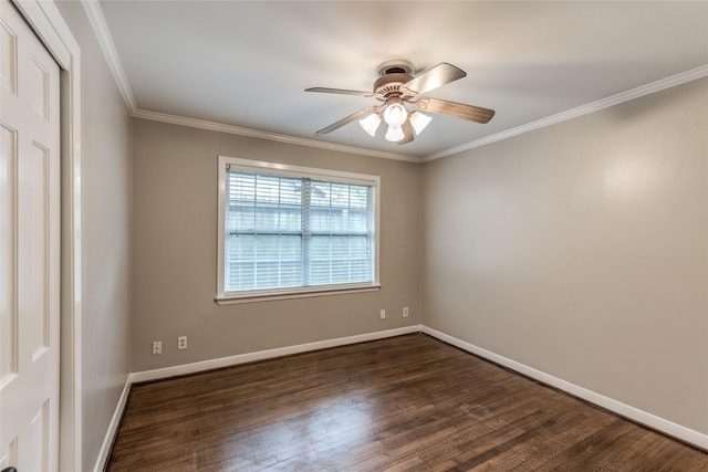 5541 Schumacher Ln, Houston, TX 77056 - spare room featuring dark wood-style flooring, ceiling fan, and ornamental molding