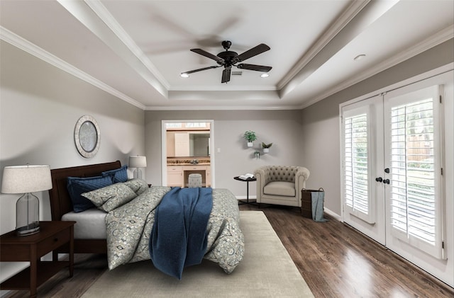 5541 Schumacher Ln, Houston, TX 77056 - bedroom with french doors, a tray ceiling, access to exterior, wood finished floors, and crown molding