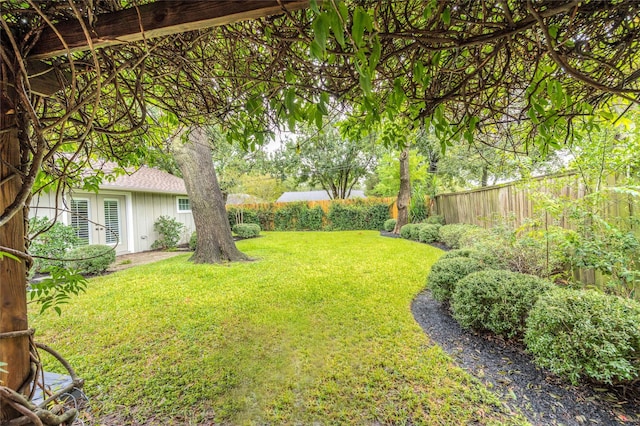 5541 Schumacher Ln, Houston, TX 77056 - fenced backyard with french doors