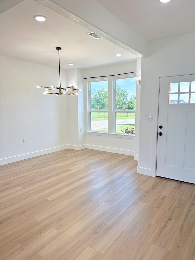 1310 Denson Allen, Coldspring, TX 77331 - entrance foyer with a chandelier, healthy amount of natural light, light wood-type flooring, and recessed lighting