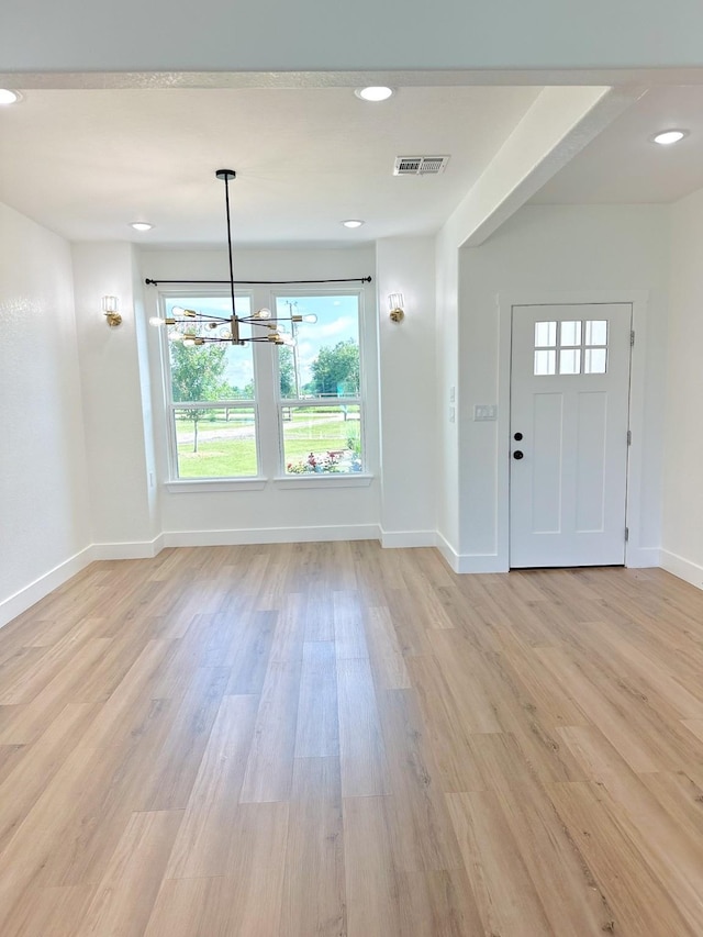 1310 Denson Allen, Coldspring, TX 77331 - entrance foyer with light wood-type flooring, a chandelier, and recessed lighting