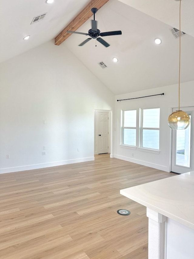 1310 Denson Allen, Coldspring, TX 77331 - unfurnished living room featuring beam ceiling, ceiling fan, recessed lighting, light wood finished floors, and high vaulted ceiling
