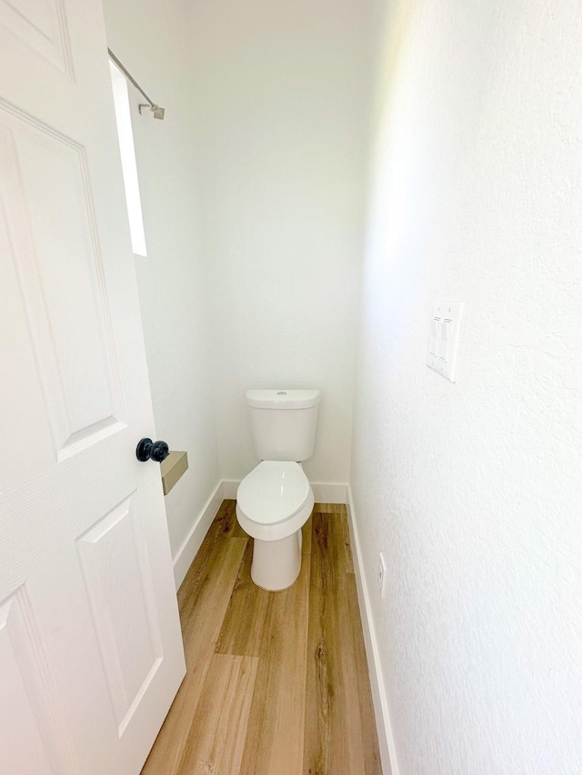 1310 Denson Allen, Coldspring, TX 77331 - bathroom featuring wood finished floors and baseboards