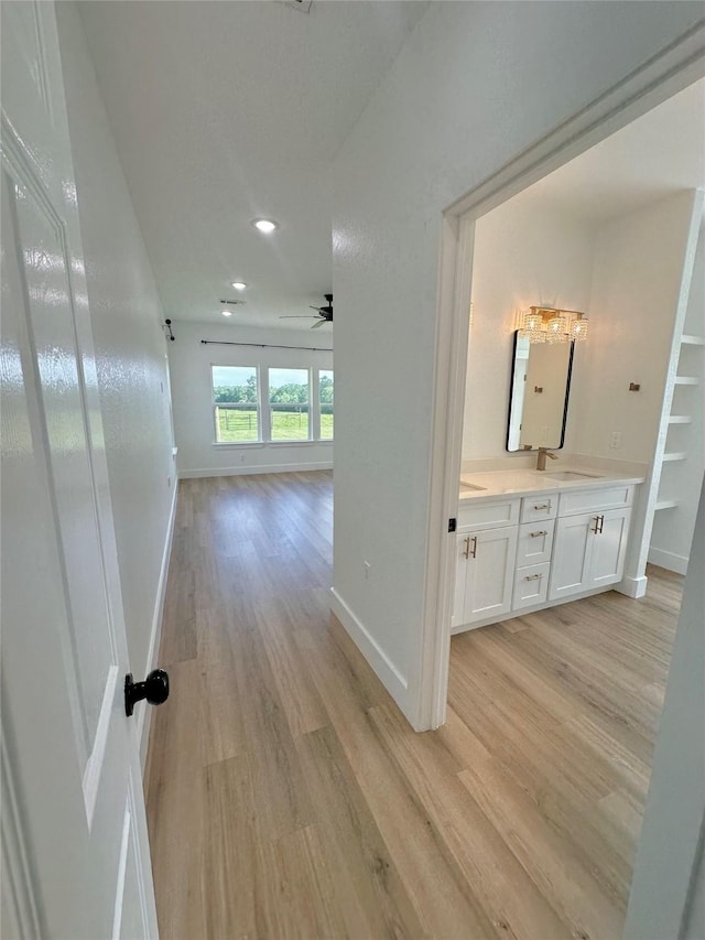 1310 Denson Allen, Coldspring, TX 77331 - hall featuring light wood-type flooring and recessed lighting