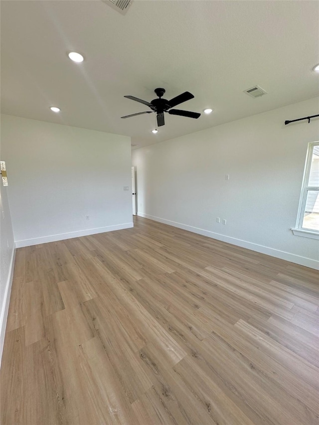 1310 Denson Allen, Coldspring, TX 77331 - empty room with light wood-type flooring, recessed lighting, and a ceiling fan