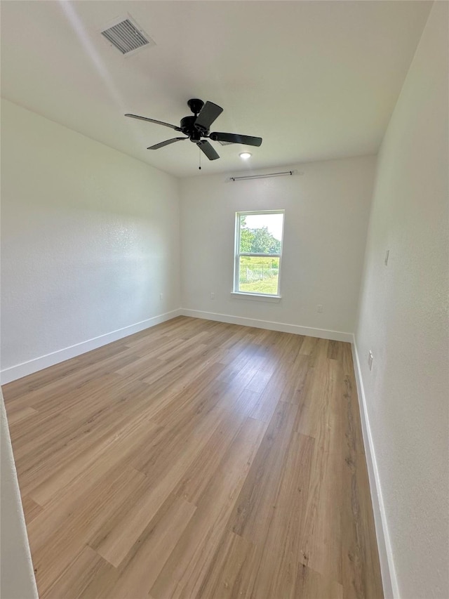 1310 Denson Allen, Coldspring, TX 77331 - empty room with light wood-style flooring and a ceiling fan