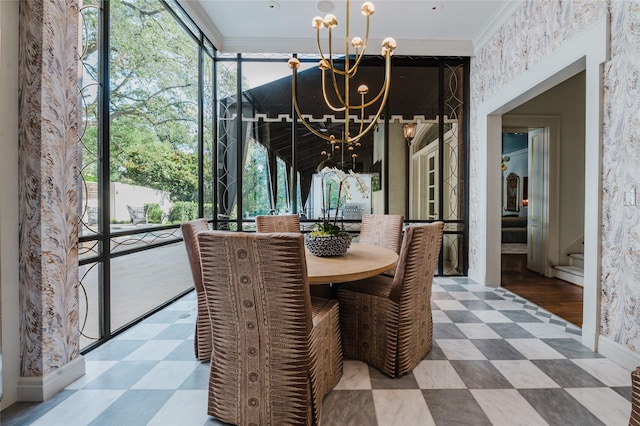 1069 Kirby Dr, Houston, TX 77019 - dining room with a chandelier, ornamental molding, and tile patterned floors