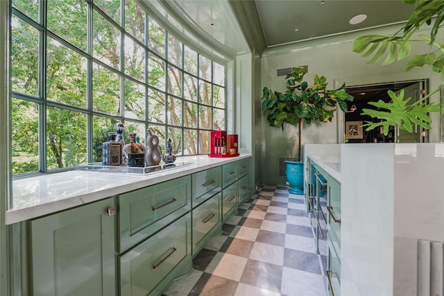 1069 Kirby Dr, Houston, TX 77019 - bathroom with tile patterned floors and crown molding