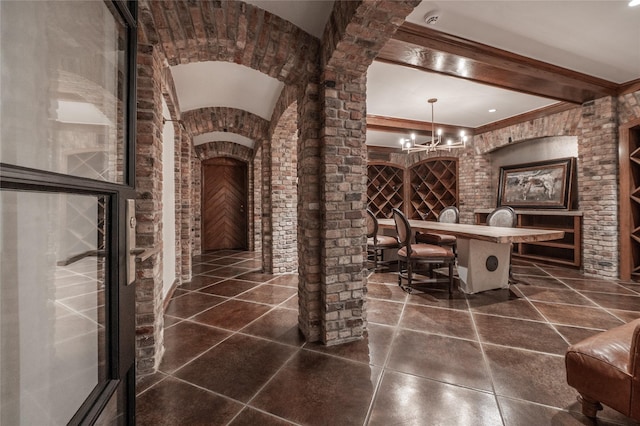 1069 Kirby Dr, Houston, TX 77019 - wine room featuring a chandelier